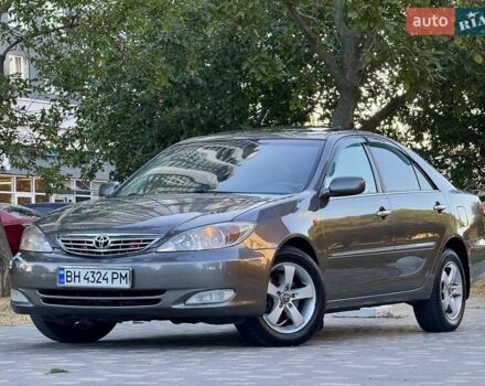 Серый Тойота Камри, объемом двигателя 2.4 л и пробегом 257 тыс. км за 5400 $, фото 73 на Automoto.ua