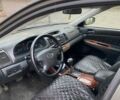 Серый Тойота Камри, объемом двигателя 2.4 л и пробегом 370 тыс. км за 4800 $, фото 5 на Automoto.ua