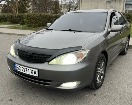 Сірий Тойота Камрі, об'ємом двигуна 3 л та пробігом 384 тис. км за 5500 $, фото 1 на Automoto.ua