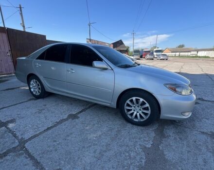 Серый Тойота Камри, объемом двигателя 3 л и пробегом 322 тыс. км за 4500 $, фото 1 на Automoto.ua