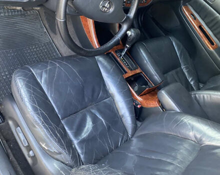 Серый Тойота Камри, объемом двигателя 2.4 л и пробегом 303 тыс. км за 5000 $, фото 2 на Automoto.ua