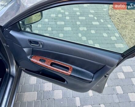 Серый Тойота Камри, объемом двигателя 2.4 л и пробегом 257 тыс. км за 5400 $, фото 34 на Automoto.ua