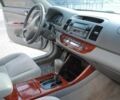 Серый Тойота Камри, объемом двигателя 2.4 л и пробегом 265 тыс. км за 6000 $, фото 4 на Automoto.ua
