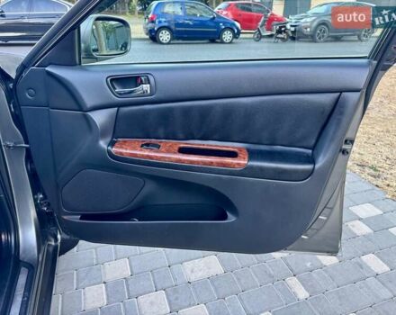 Серый Тойота Камри, объемом двигателя 2.4 л и пробегом 257 тыс. км за 5400 $, фото 39 на Automoto.ua