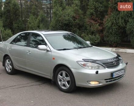 Серый Тойота Камри, объемом двигателя 2.4 л и пробегом 375 тыс. км за 5500 $, фото 1 на Automoto.ua