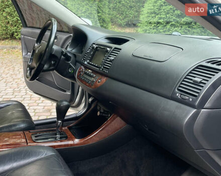 Серый Тойота Камри, объемом двигателя 3 л и пробегом 240 тыс. км за 6250 $, фото 24 на Automoto.ua