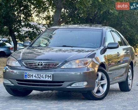 Серый Тойота Камри, объемом двигателя 2.4 л и пробегом 257 тыс. км за 5400 $, фото 5 на Automoto.ua