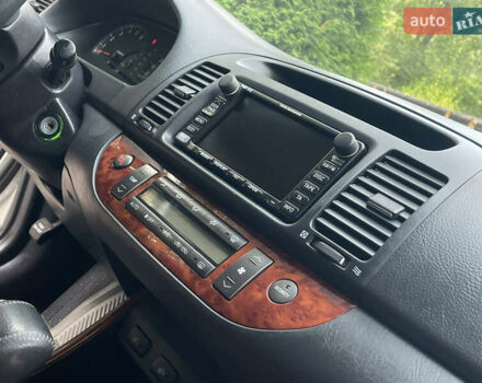 Серый Тойота Камри, объемом двигателя 3 л и пробегом 240 тыс. км за 6250 $, фото 25 на Automoto.ua