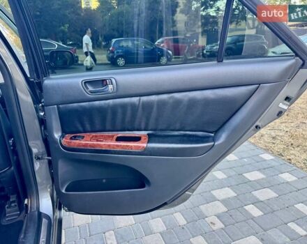 Серый Тойота Камри, объемом двигателя 2.4 л и пробегом 257 тыс. км за 5400 $, фото 47 на Automoto.ua