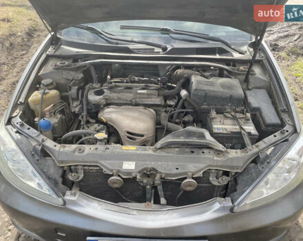 Серый Тойота Камри, объемом двигателя 2.4 л и пробегом 303 тыс. км за 5000 $, фото 4 на Automoto.ua