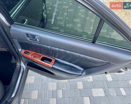 Серый Тойота Камри, объемом двигателя 2.4 л и пробегом 257 тыс. км за 5400 $, фото 28 на Automoto.ua