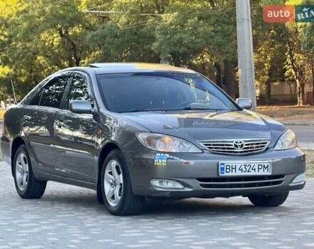 Серый Тойота Камри, объемом двигателя 2.4 л и пробегом 257 тыс. км за 5400 $, фото 3 на Automoto.ua