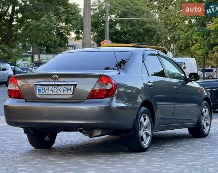 Серый Тойота Камри, объемом двигателя 2.4 л и пробегом 257 тыс. км за 5400 $, фото 55 на Automoto.ua