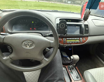 Серый Тойота Камри, объемом двигателя 2.4 л и пробегом 420 тыс. км за 6200 $, фото 6 на Automoto.ua