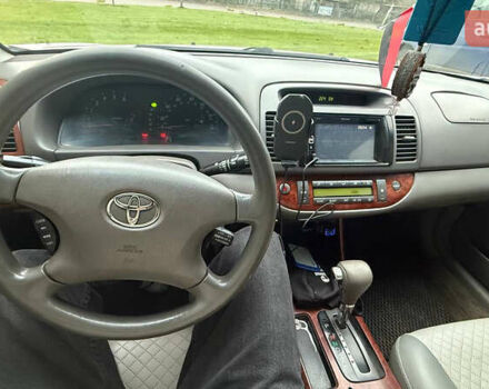 Серый Тойота Камри, объемом двигателя 2.4 л и пробегом 400 тыс. км за 5000 $, фото 9 на Automoto.ua