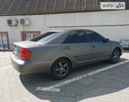 Серый Тойота Камри, объемом двигателя 3 л и пробегом 406 тыс. км за 5500 $, фото 4 на Automoto.ua