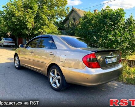 Сірий Тойота Камрі, об'ємом двигуна 3 л та пробігом 390 тис. км за 6000 $, фото 2 на Automoto.ua