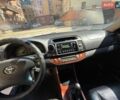 Серый Тойота Камри, объемом двигателя 2.36 л и пробегом 237 тыс. км за 2499 $, фото 1 на Automoto.ua