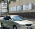 Серый Тойота Камри, объемом двигателя 2.4 л и пробегом 325 тыс. км за 4500 $, фото 2 на Automoto.ua