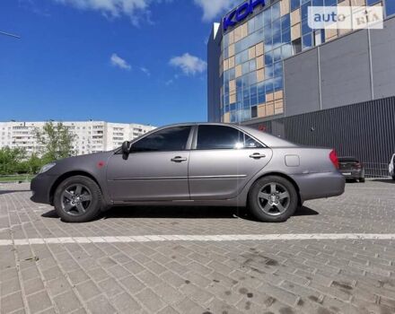 Серый Тойота Камри, объемом двигателя 3 л и пробегом 406 тыс. км за 5500 $, фото 1 на Automoto.ua