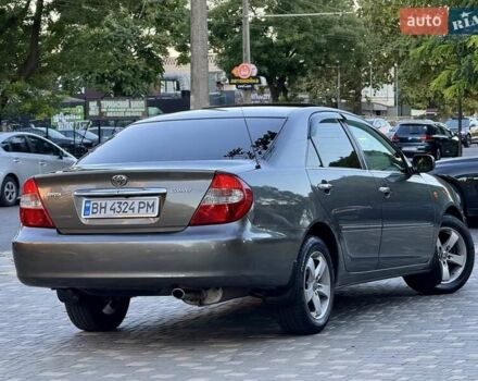 Серый Тойота Камри, объемом двигателя 2.4 л и пробегом 257 тыс. км за 5400 $, фото 52 на Automoto.ua