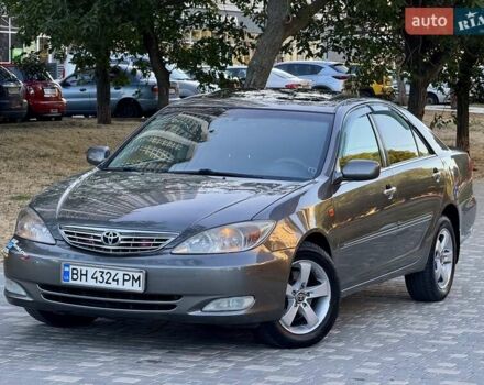 Серый Тойота Камри, объемом двигателя 2.4 л и пробегом 257 тыс. км за 5400 $, фото 72 на Automoto.ua