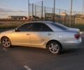 Серый Тойота Камри, объемом двигателя 2.4 л и пробегом 256 тыс. км за 4900 $, фото 4 на Automoto.ua