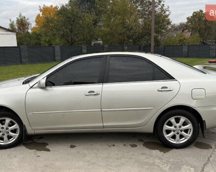 Серый Тойота Камри, объемом двигателя 2.4 л и пробегом 420 тыс. км за 6200 $, фото 3 на Automoto.ua