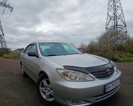 Серый Тойота Камри, объемом двигателя 2.4 л и пробегом 300 тыс. км за 4200 $, фото 4 на Automoto.ua