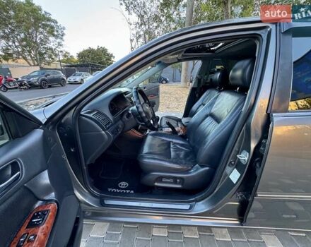 Серый Тойота Камри, объемом двигателя 2.4 л и пробегом 257 тыс. км за 5400 $, фото 58 на Automoto.ua