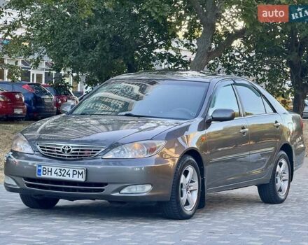 Серый Тойота Камри, объемом двигателя 2.4 л и пробегом 257 тыс. км за 5400 $, фото 4 на Automoto.ua