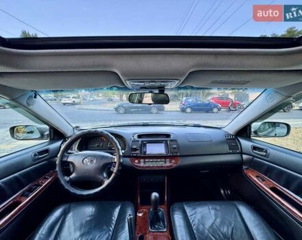 Серый Тойота Камри, объемом двигателя 2.4 л и пробегом 257 тыс. км за 5400 $, фото 14 на Automoto.ua