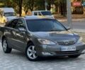 Серый Тойота Камри, объемом двигателя 2.4 л и пробегом 257 тыс. км за 5400 $, фото 64 на Automoto.ua