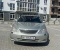 Сірий Тойота Камрі, об'ємом двигуна 2.36 л та пробігом 248 тис. км за 4500 $, фото 1 на Automoto.ua