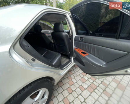 Серый Тойота Камри, объемом двигателя 3 л и пробегом 240 тыс. км за 6250 $, фото 29 на Automoto.ua