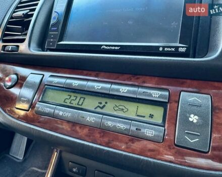 Серый Тойота Камри, объемом двигателя 2.4 л и пробегом 257 тыс. км за 5400 $, фото 30 на Automoto.ua