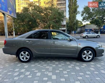 Серый Тойота Камри, объемом двигателя 2.4 л и пробегом 257 тыс. км за 5400 $, фото 76 на Automoto.ua