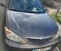 Серый Тойота Камри, объемом двигателя 2.4 л и пробегом 200 тыс. км за 6100 $, фото 1 на Automoto.ua