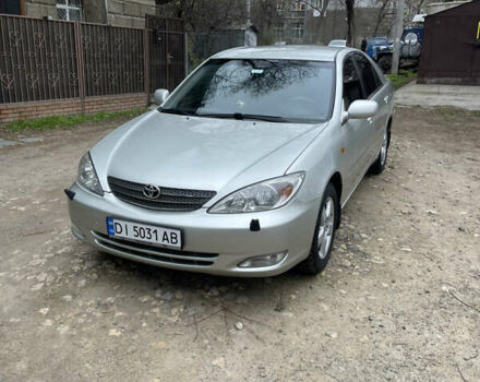 Серый Тойота Камри, объемом двигателя 3 л и пробегом 229 тыс. км за 7000 $, фото 1 на Automoto.ua