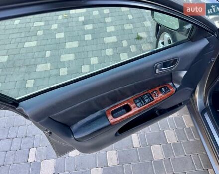 Серый Тойота Камри, объемом двигателя 2.4 л и пробегом 257 тыс. км за 5400 $, фото 68 на Automoto.ua