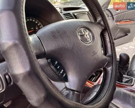 Серый Тойота Камри, объемом двигателя 2.4 л и пробегом 257 тыс. км за 5400 $, фото 43 на Automoto.ua