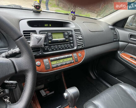 Серый Тойота Камри, объемом двигателя 3 л и пробегом 229 тыс. км за 7000 $, фото 8 на Automoto.ua