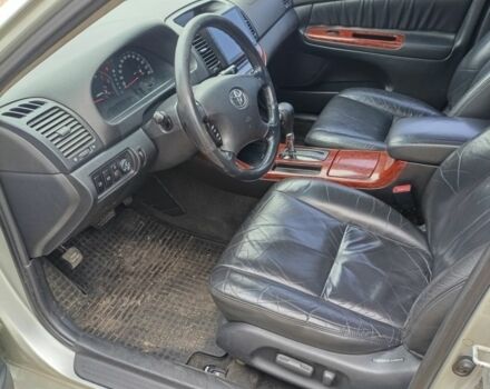 Серый Тойота Камри, объемом двигателя 2.4 л и пробегом 390 тыс. км за 5000 $, фото 5 на Automoto.ua