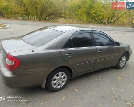 Сірий Тойота Камрі, об'ємом двигуна 2.4 л та пробігом 237 тис. км за 5000 $, фото 2 на Automoto.ua