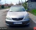Серый Тойота Камри, объемом двигателя 2.4 л и пробегом 275 тыс. км за 3700 $, фото 1 на Automoto.ua