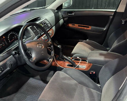 Серый Тойота Камри, объемом двигателя 2.4 л и пробегом 101 тыс. км за 7500 $, фото 5 на Automoto.ua