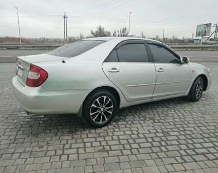 Серый Тойота Камри, объемом двигателя 2.4 л и пробегом 365 тыс. км за 5700 $, фото 7 на Automoto.ua