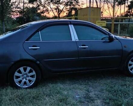 Серый Тойота Камри, объемом двигателя 2.36 л и пробегом 350 тыс. км за 4500 $, фото 1 на Automoto.ua