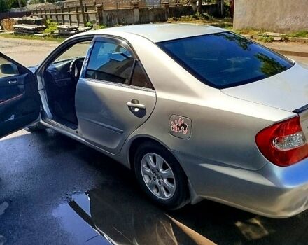 Сірий Тойота Камрі, об'ємом двигуна 2.4 л та пробігом 260 тис. км за 5500 $, фото 1 на Automoto.ua