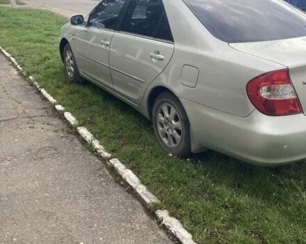 Сірий Тойота Камрі, об'ємом двигуна 2.4 л та пробігом 300 тис. км за 5400 $, фото 1 на Automoto.ua